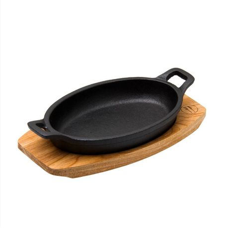 Regent Cookware Cast Iron Oval Pan with 2 Handle On Birch Wood Board 30920